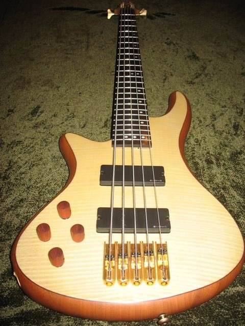 Left-handed six-string bass with a flamed maple top